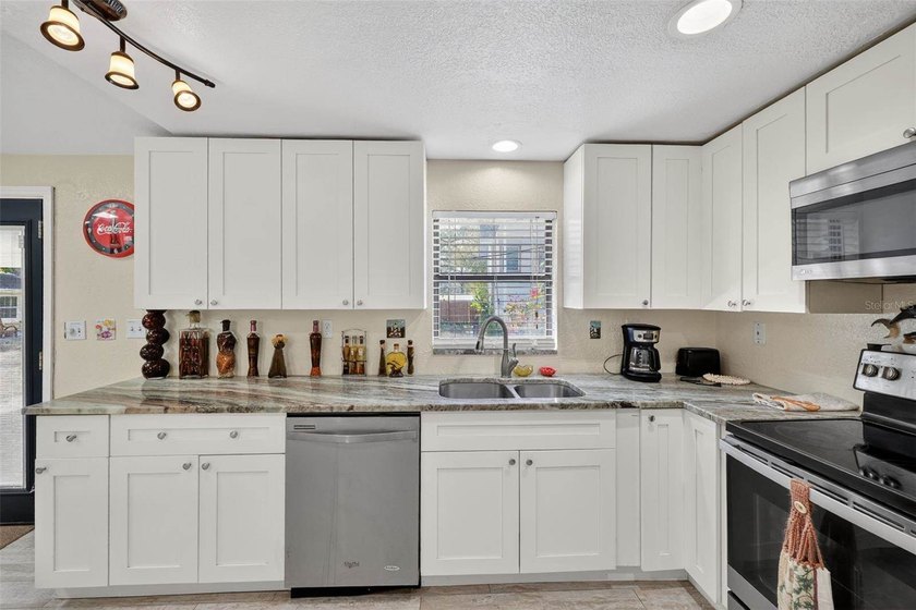 Investor's dream! Situated on 1 acre in a prime location, this - photo 19