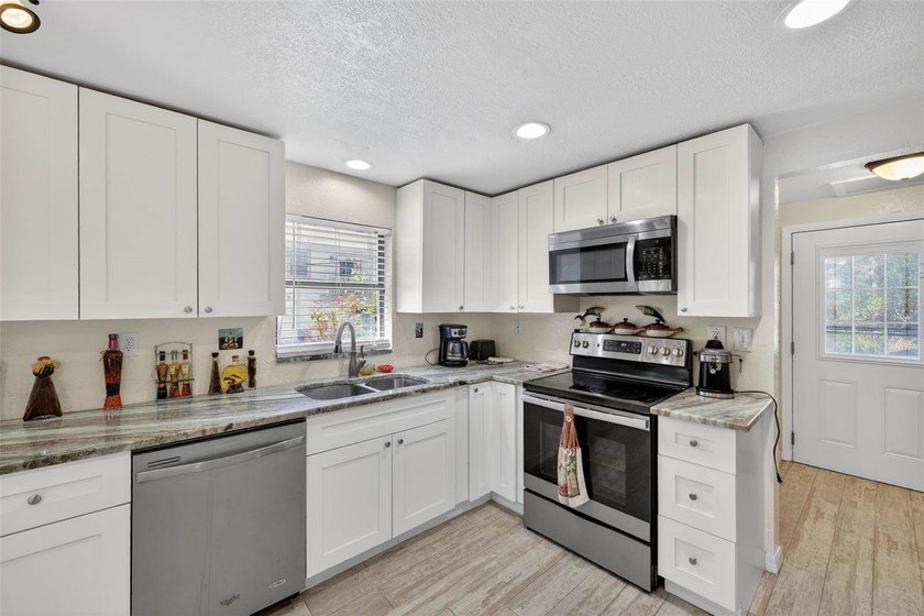 Investor's dream! Situated on 1 acre in a prime location, this - photo 20