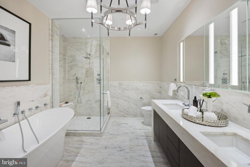 Discover luxury city living in this gorgeous 19th-floor home in - photo 22