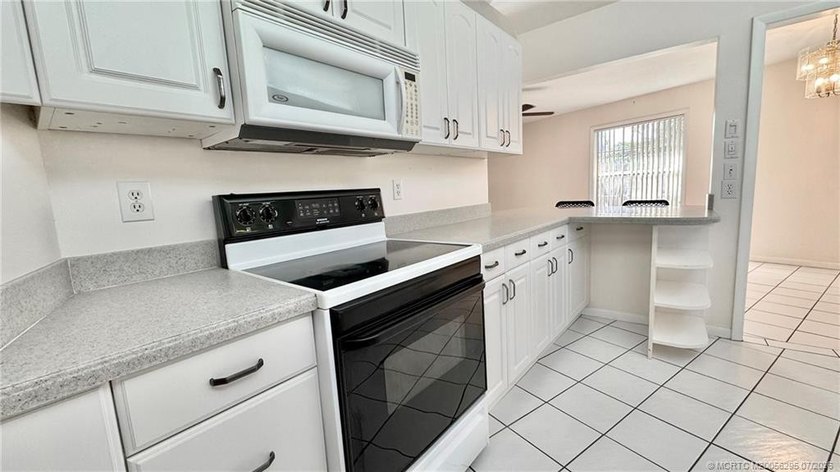 Welcome to this charming waterfront residence in Village Oaks - photo 11