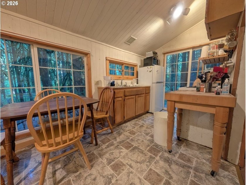 Built in 1930 and tucked among towering firs in the Mt. Hood - photo 17
