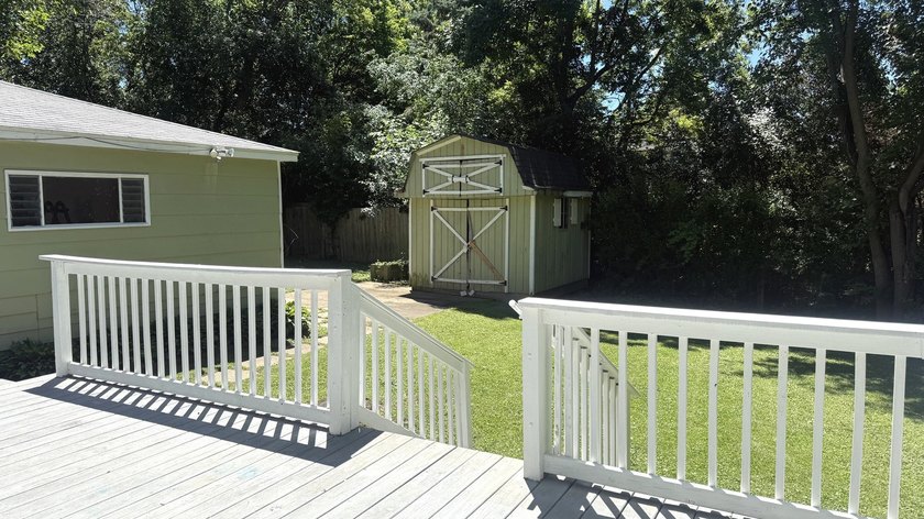 Enjoy the perfect blend of privacy and lake-area living in this - photo 26