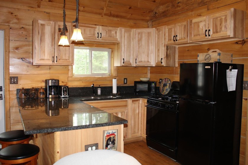 Located in the heart of the Northwoods on Moen Lake, this - photo 11
