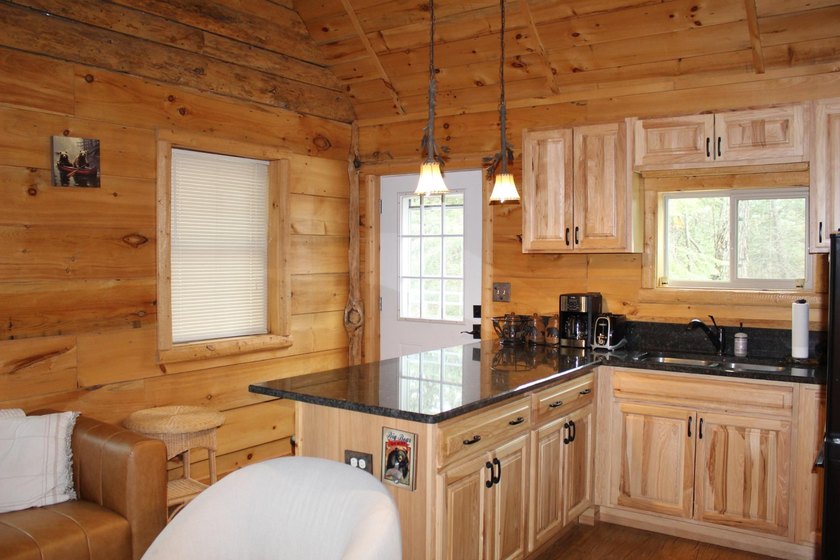 Located in the heart of the Northwoods on Moen Lake, this - photo 13