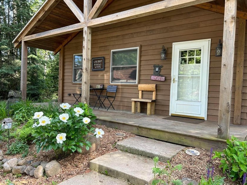 Located in the heart of the Northwoods on Moen Lake, this - photo 19
