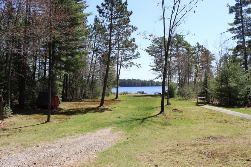 Located in the heart of the Northwoods on Moen Lake, this - photo 20