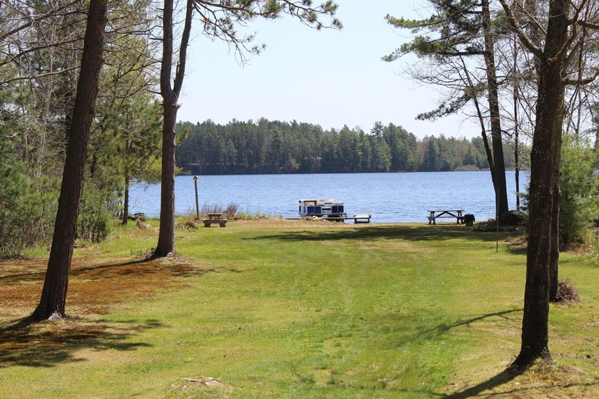 Located in the heart of the Northwoods on Moen Lake, this - photo 21