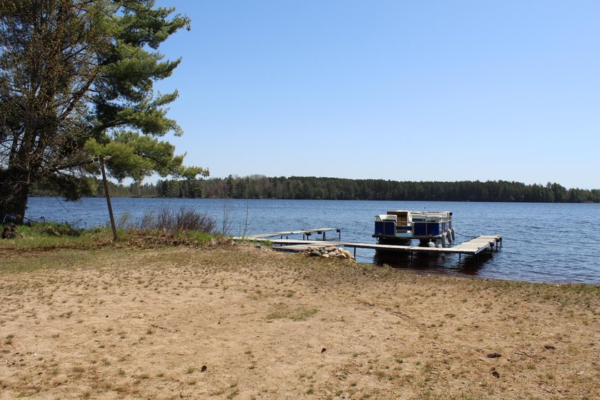 Located in the heart of the Northwoods on Moen Lake, this - photo 22