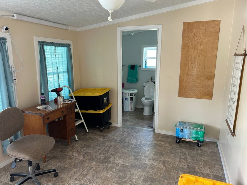 MOBILE HOME W/ ADDITION-STORAGE BLDGS. - NEAR HOLMES BEND MARINA - photo 33