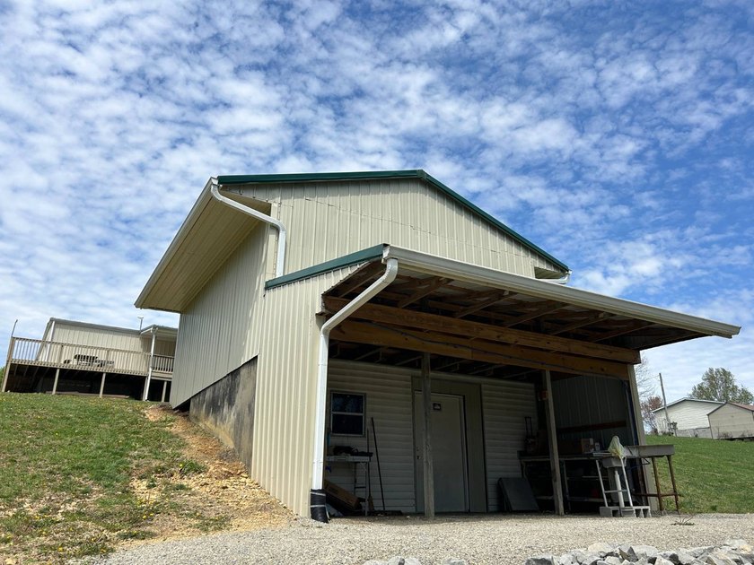 MOBILE HOME W/ ADDITION-STORAGE BLDGS. - NEAR HOLMES BEND MARINA - photo 46