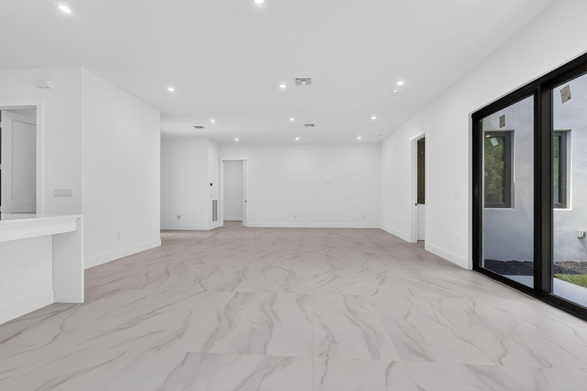 Welcome to this 2026 modern residence, nestled on a private - photo 11