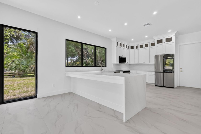 Welcome to this 2026 modern residence, nestled on a private - photo 14