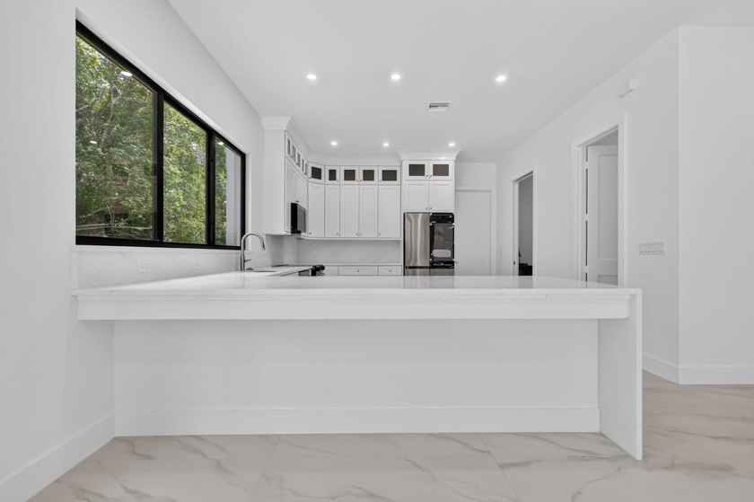 Welcome to this 2026 modern residence, nestled on a private - photo 15