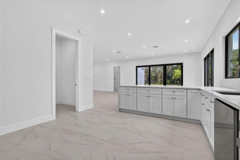 Welcome to this 2026 modern residence, nestled on a private - photo 17