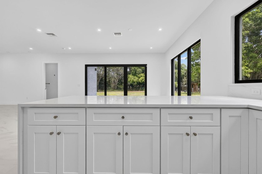 Welcome to this 2026 modern residence, nestled on a private - photo 18