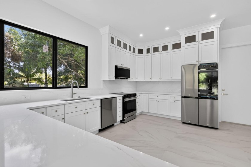 Welcome to this 2026 modern residence, nestled on a private - photo 19