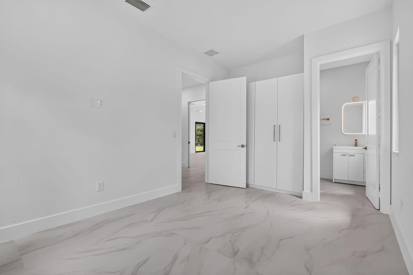 Welcome to this 2026 modern residence, nestled on a private - photo 24