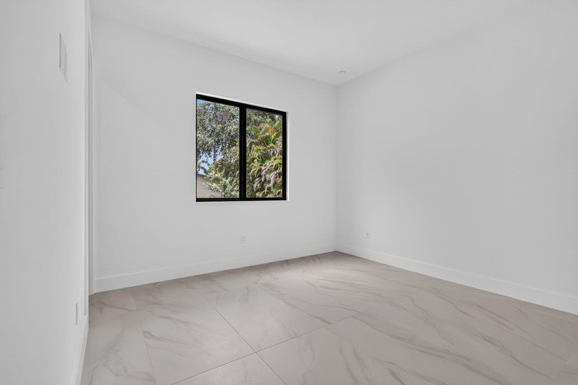 Welcome to this 2026 modern residence, nestled on a private - photo 27