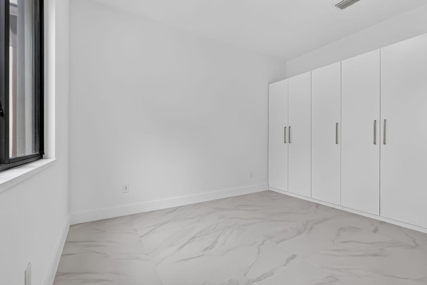 Welcome to this 2026 modern residence, nestled on a private - photo 28