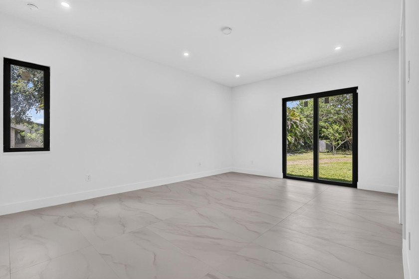 Welcome to this 2026 modern residence, nestled on a private - photo 32