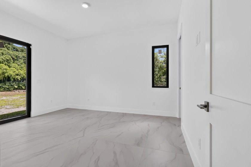 Welcome to this 2026 modern residence, nestled on a private - photo 39