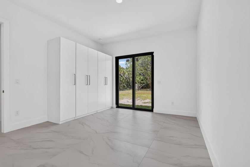 Welcome to this 2026 modern residence, nestled on a private - photo 40