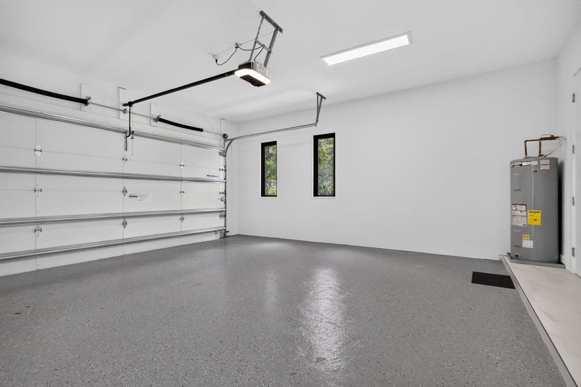 Welcome to this 2026 modern residence, nestled on a private - photo 45