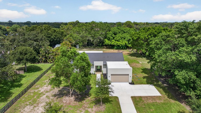 Welcome to this 2026 modern residence, nestled on a private - photo 48