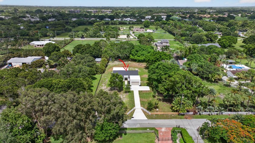 Welcome to this 2026 modern residence, nestled on a private - photo 49