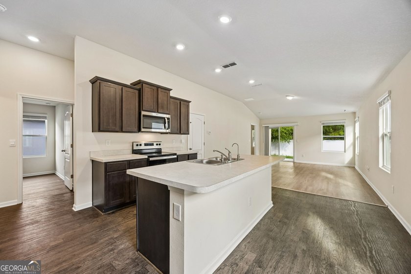 Discover this beautifully designed newer-construction home - photo 11