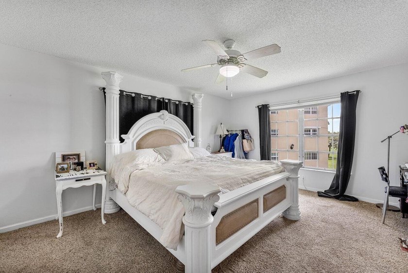 Top floor corner unit with panoramic views of the golf course - photo 14