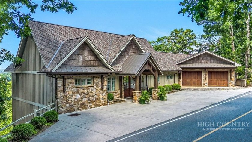Experience elegant mountain living in this warm and inviting - photo 4