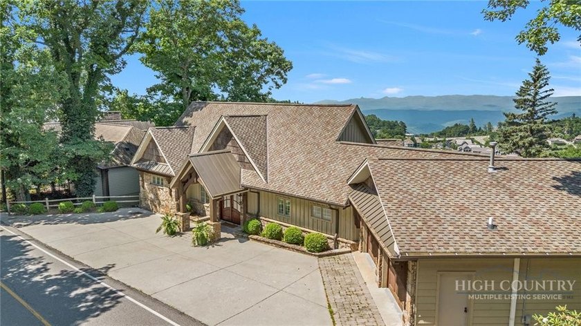 Experience elegant mountain living in this warm and inviting - photo 8