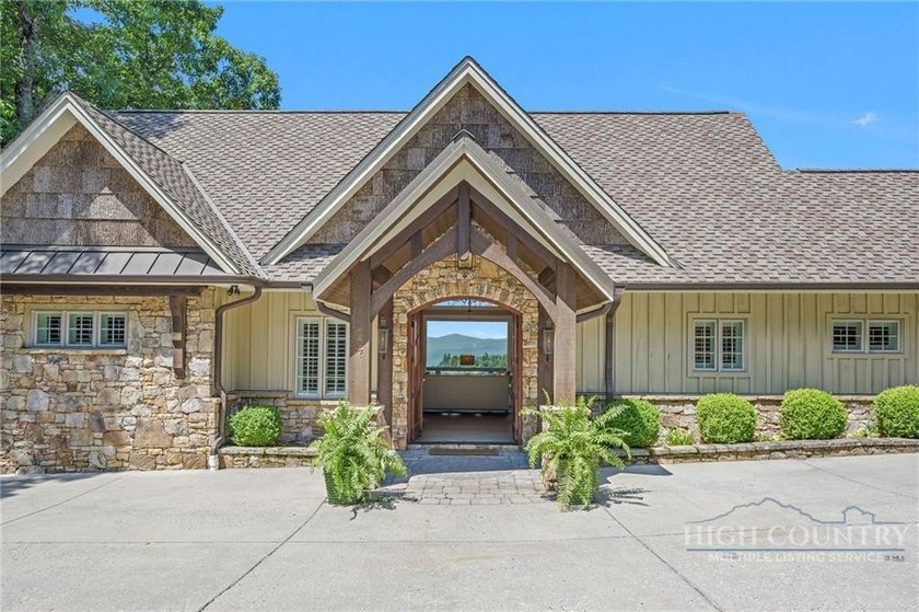 Experience elegant mountain living in this warm and inviting - photo 9