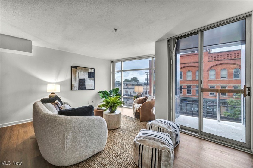 Experience modern and convenient city living in this stylish - photo 3