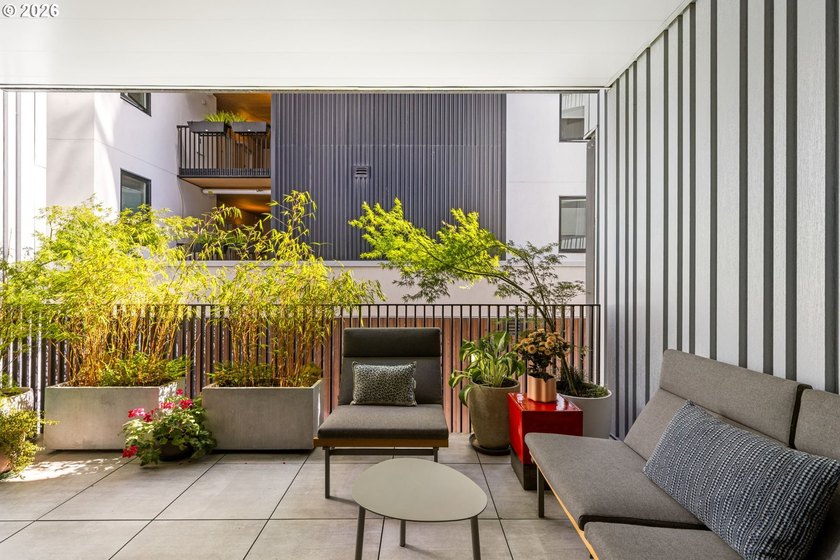 Experience elevated urban living at Carbon12, an award-winning - photo 23