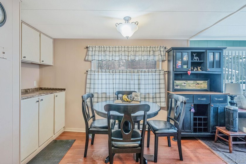 Charming 2-Bedroom Mobile Home in River Woods Welcome to this - photo 10