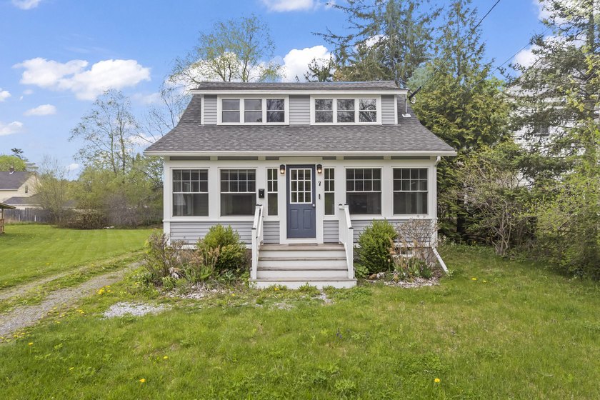 This charming downtown bungalow can't wait to meet you! With - photo 3