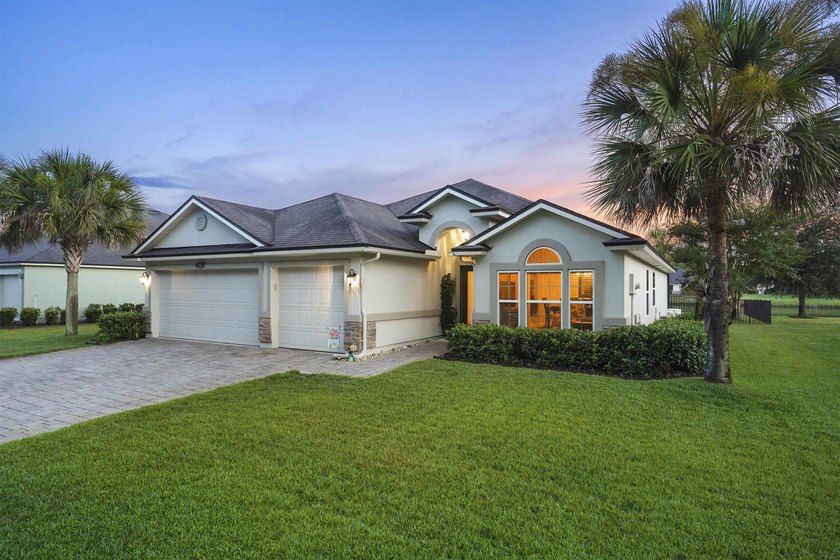 Beach, lake, and woods-this charming home has it all. Located - photo 3