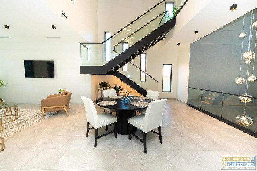 Come view this exquisite channel-front coastal home. With its - photo 28