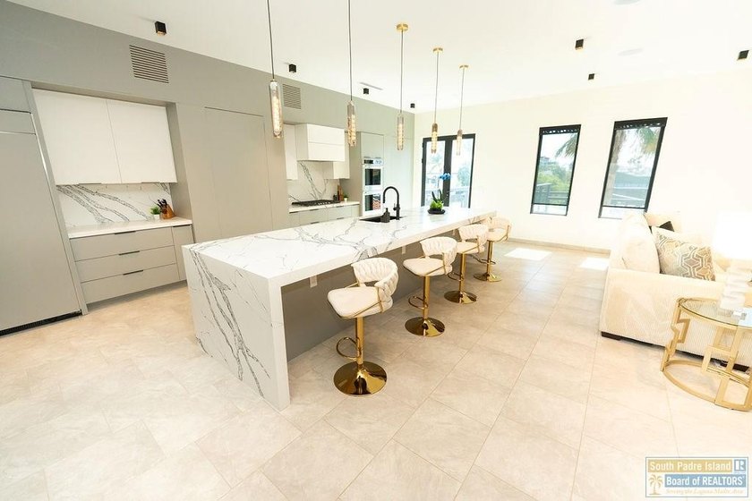Come view this exquisite channel-front coastal home. With its - photo 29
