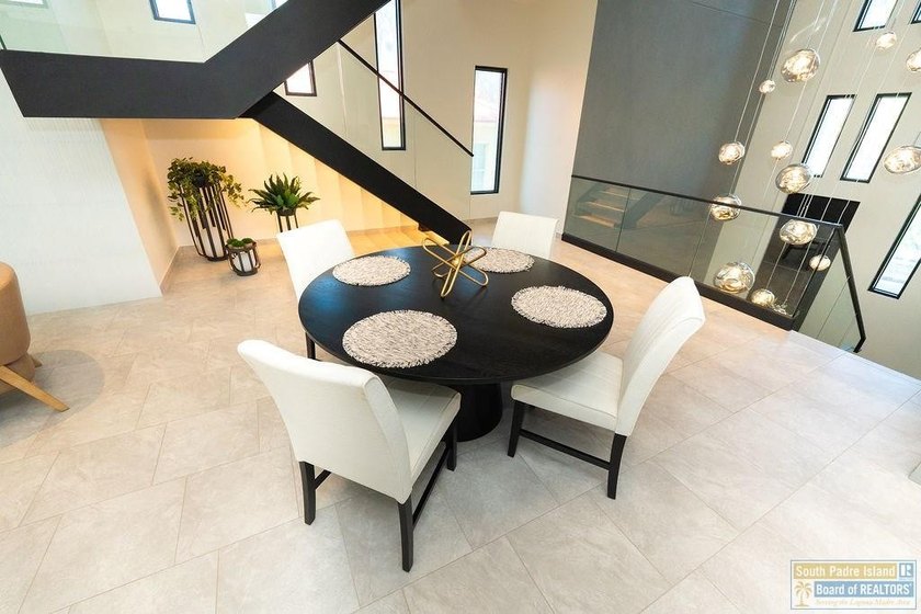 Come view this exquisite channel-front coastal home. With its - photo 36