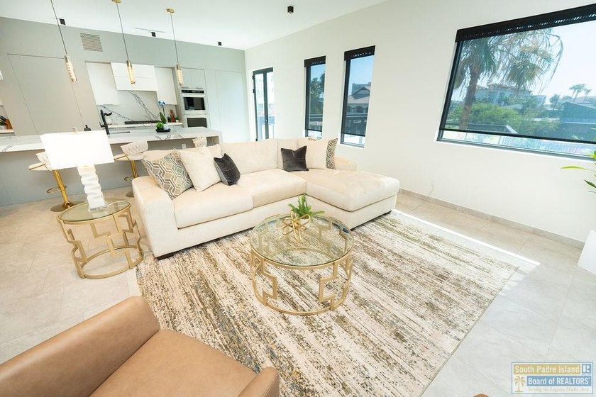 Come view this exquisite channel-front coastal home. With its - photo 37