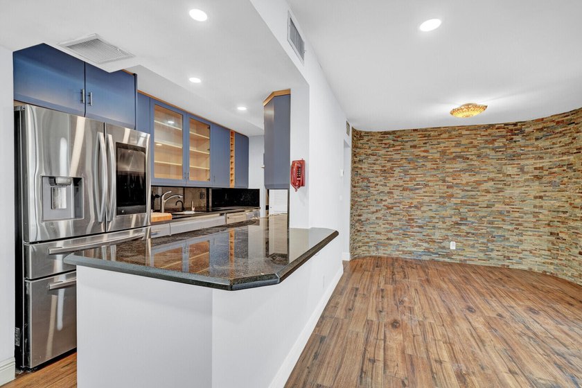 Experience coastal living at its finest from this beautifully - photo 4