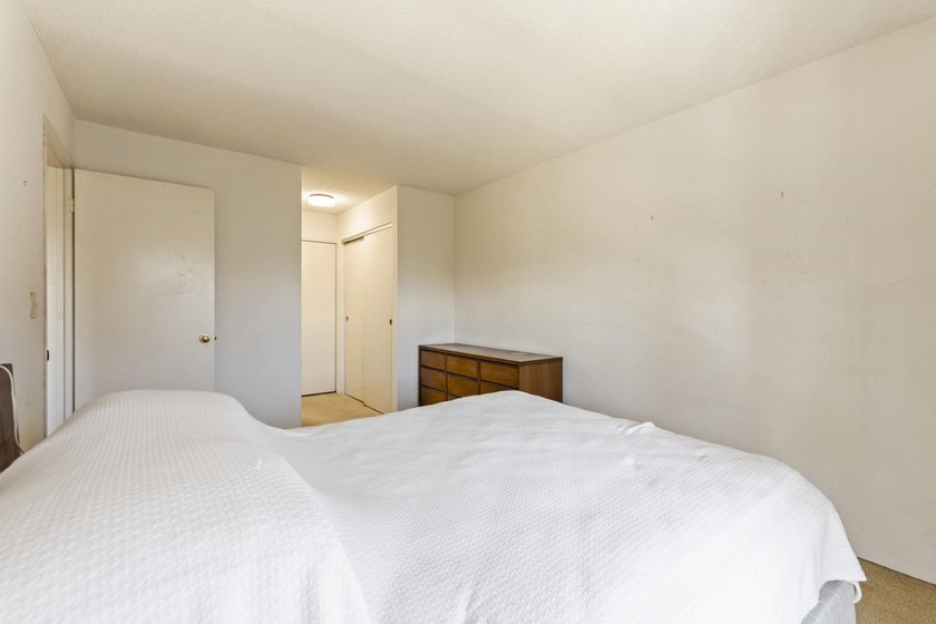 Two bedroom 1.5 bath second floor condo priced to sell in very - photo 19