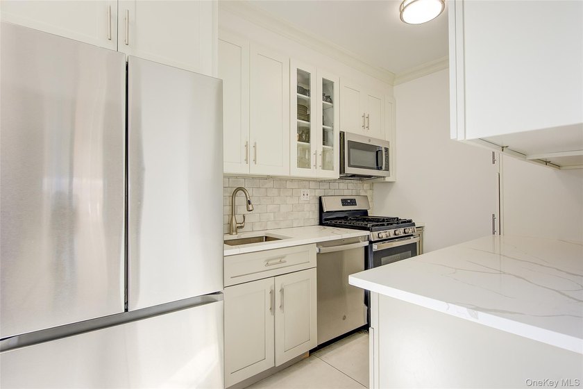 Welcome to this stunning Top-Floor 2-Bedroom, 2-Bath in an - photo 15