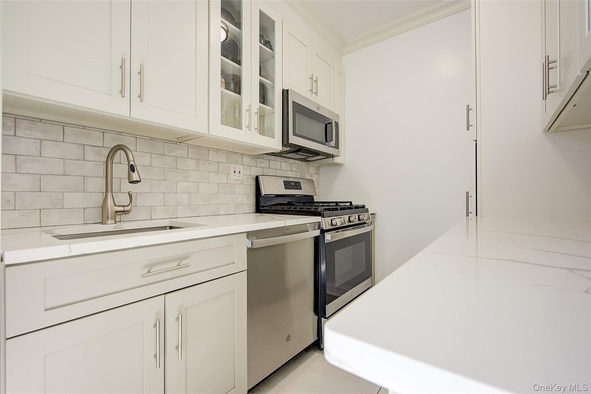 Welcome to this stunning Top-Floor 2-Bedroom, 2-Bath in an - photo 16