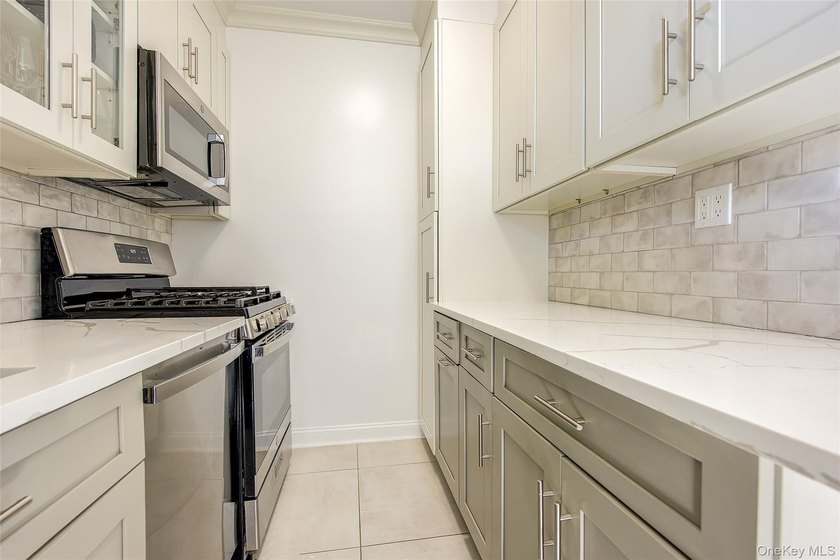 Welcome to this stunning Top-Floor 2-Bedroom, 2-Bath in an - photo 17