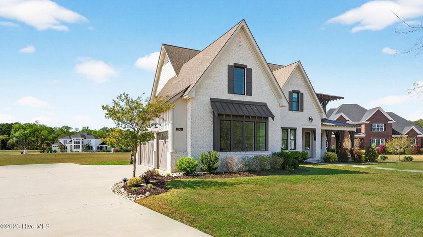 Welcome to 1196 Seasons End Lane--an architecturally striking - photo 4