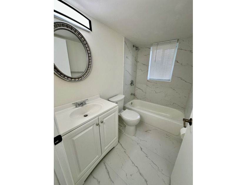 Fully Remodeled 2/2 Corner Unit in Margate! Step into this - photo 7